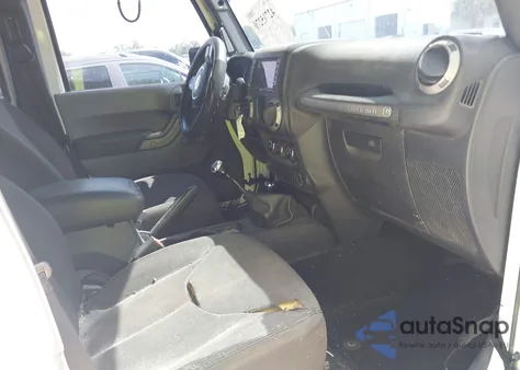 2015 Jeep Wrangler Unlimited Willys Wheeler из США, поврежденный, VIN 1C4BJWDG1FL666131